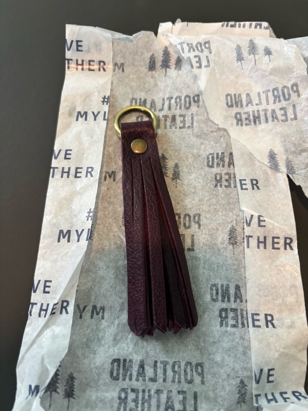 Portland Leather Tassel Keychain in plum